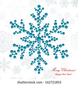 Big snowflake made of shiny beads. Christmas background.
