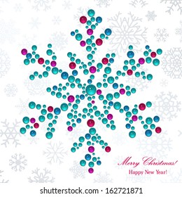 Big snowflake made of shiny beads. Christmas background.