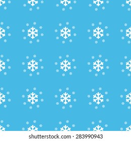 Big snowflake surrounded with smaller ones, repeated in straight lines on blue background