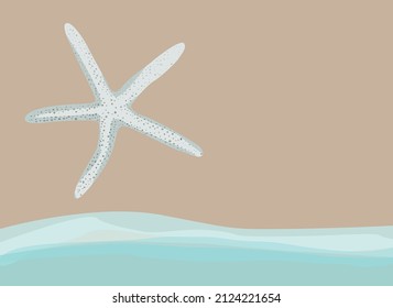 Big starfish on a beach next to blue wave