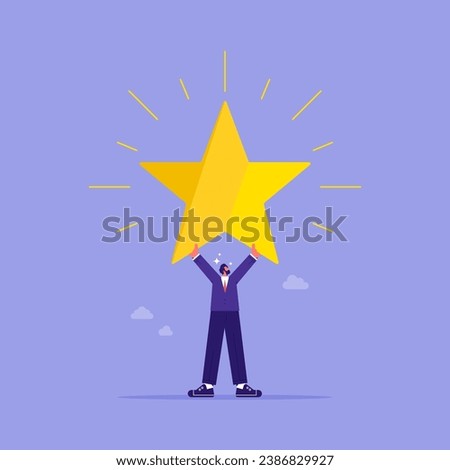 Big success or achievement concept, businesswoman holding a big star. business concept, challenge and effort to win award 