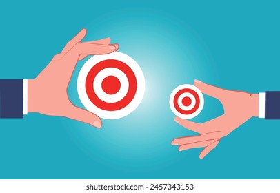 Big target vs. small target, task or goal, one hand holding a big target and the other hand holding a small target