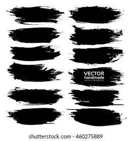 Big textured strokes thick black paint  isolated on a white background