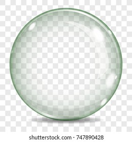 Big transparent glass sphere with a green tint, glares and shadow, on a plaid background.