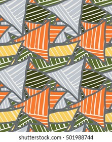 Big triangles orange green striped.Hand drawn with ink seamless background.Creative handmade repainting design for fabric or textile.Geometric pattern with triangles.Vintage retro colors