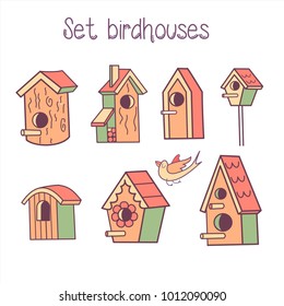 Big vector set of birdhouses. Spring clipart. The bird flies to the birdhouse. Isolated on a white background.