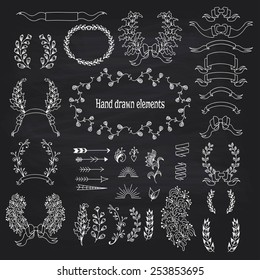 Big vector set of calligraphic design elements on chalkboard.