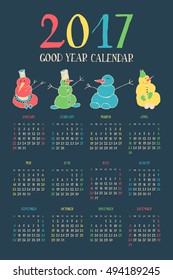 Big wall monthly calendar for New Year 2017. Decorative vintage hand drawn funny snowmen. Sunday start