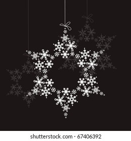 Big white snowflake hangs on black background