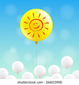 Big yellow balloon with sunny face is flying in the blue sky, many little white balloons below