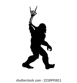 Bigfoot with rock and roll sign. Yeti with heavy metal hand. Skeleton hand silhouette. Halloween party element for home decoration, laser cut, crafting, T shirt design. Vector illustration