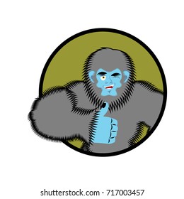 Bigfoot thumbs up. Yeti winks emoji. Abominable snowman cheerful. Vector illustration
