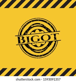 Bigot black grunge emblem inside yellow warning sign. Vector Illustration. Detailed.