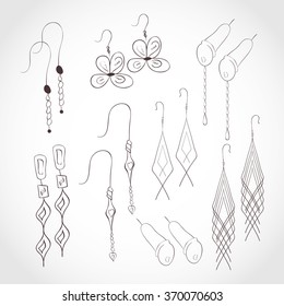 Bijouterie. Earrings, clips. On a white background. Set. Doodle. Sketch