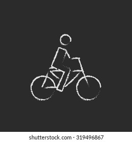 Bike and cyclist hand drawn in chalk on a blackboard vector white icon isolated on a black background.