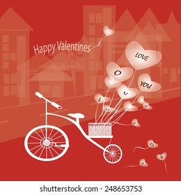 The bike features a heart balloon