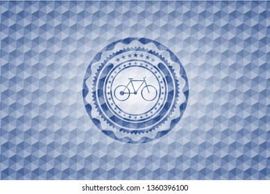 bike icon inside blue emblem or badge with abstract geometric pattern background.