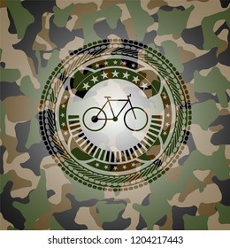 bike icon inside camouflaged emblem