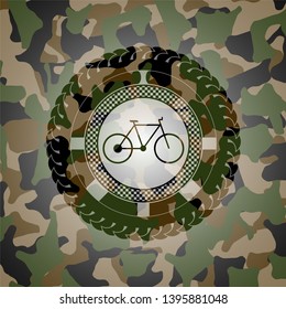 bike icon inside camouflaged emblem