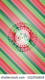 bike icon inside christmas colors style badge.