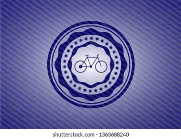 bike icon inside denim background