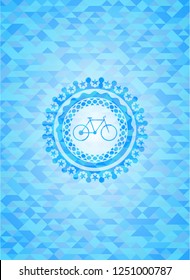 bike icon inside light blue emblem. Mosaic background
