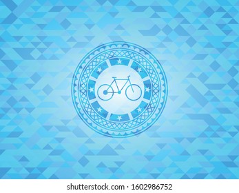 bike icon inside sky blue mosaic emblem