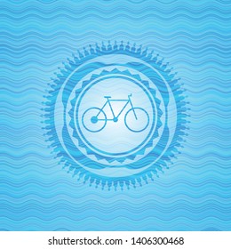 bike icon inside water wave emblem background.