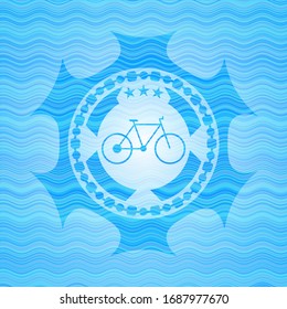 bike icon inside water wave emblem.