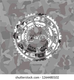 bike icon on grey camouflaged pattern