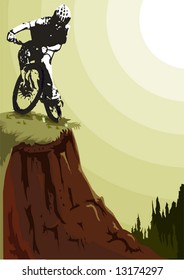 Biker goes down a track of the mountain.