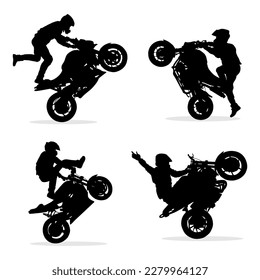 Biker silhouette doing freestyle on his motorbike.Vector illustration set