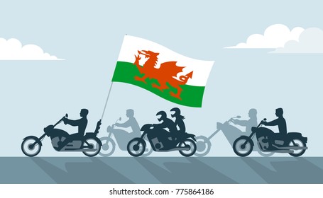 Bikers on motorcycles with wales flag