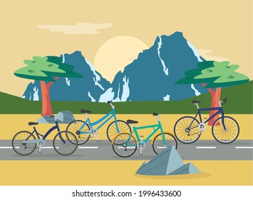 bikes vehicles at street in front of mountains