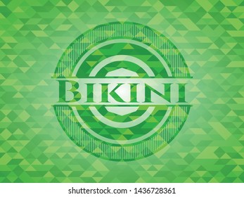 Bikini green emblem with mosaic background. Vector Illustration. Detailed.