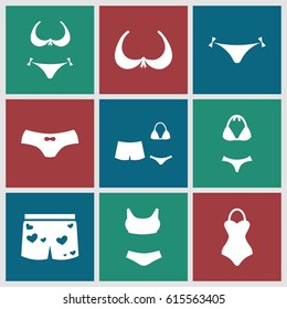 Bikini icons set. set of 9 bikini filled icons such as panties with heart, bra, bikini, female underwear, underwear with heart, swimsuit