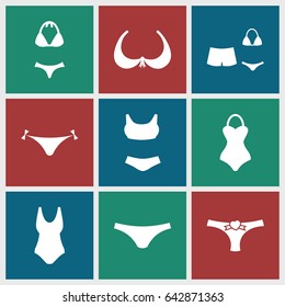 Bikini icons set. set of 9 bikini filled icons such as panties with heart, bra, female underwear, swimsuit