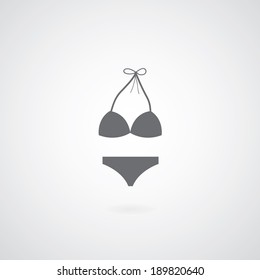 bikini symbol on gray background 