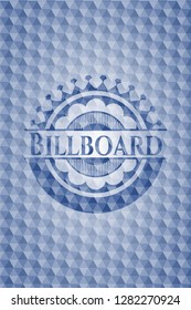 Billboard blue badge with geometric pattern.