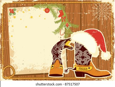 Billboard frame with cowboy boots and Santa's red hat on wood wall.Vector christmas background for text