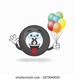 Billiard ball mascot character holding a balloon. vector illustration