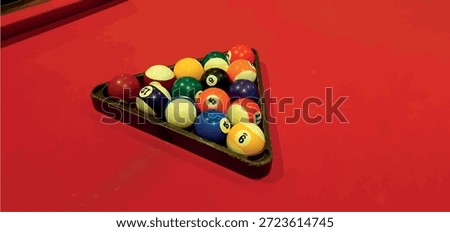 Billiards game. Billiard table with balls. Billiard balls in a triangular frame.
