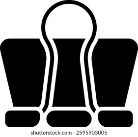 Binder Clip Icon for Office Supplies and Document Organization. Glyph Icon