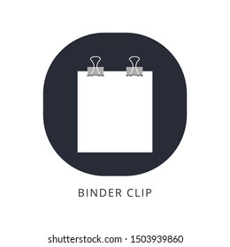 Binder clips on a piece of paper on a white background.