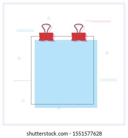 Binder clips on a piece of paper on a white background.