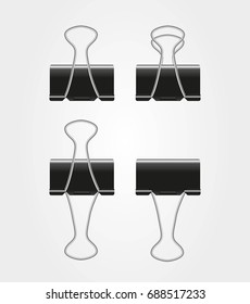 Binders clips isolated on light background