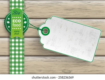 Bio Food Label With Price Sticker On The Wooden Background. Eps 10 Vector File.