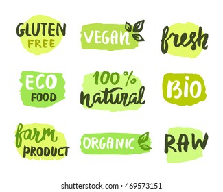 Bio natural food concept. Set of vector labels. Emblems, stickers, stamps design. Ecology logo. Eco, organic, raw, home grown, vegan, gluten free, fresh farm product. Hand drawn lettering, stains