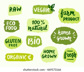 Bio natural food concept. Set of vector labels. Emblems, stickers, stamps design. Ecology logo. Eco, organic, raw, home grown, vegan, gluten free, fresh farm product. Hand drawn lettering, stains