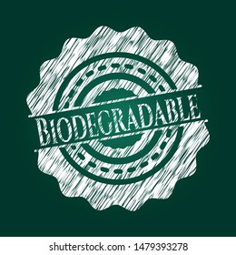 Biodegradable written on a blackboard. Vector Illustration. Detailed.
